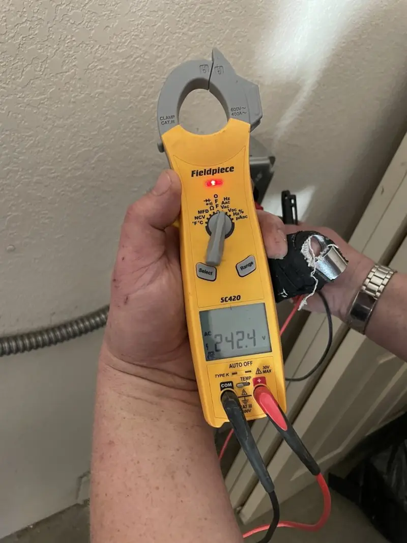Voltage testing with clamp meter during Ceiling Fan Installation in Dunmore